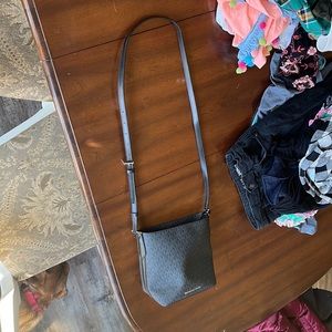 Black signature Michael Kors small crossbody or shoulder purse bag